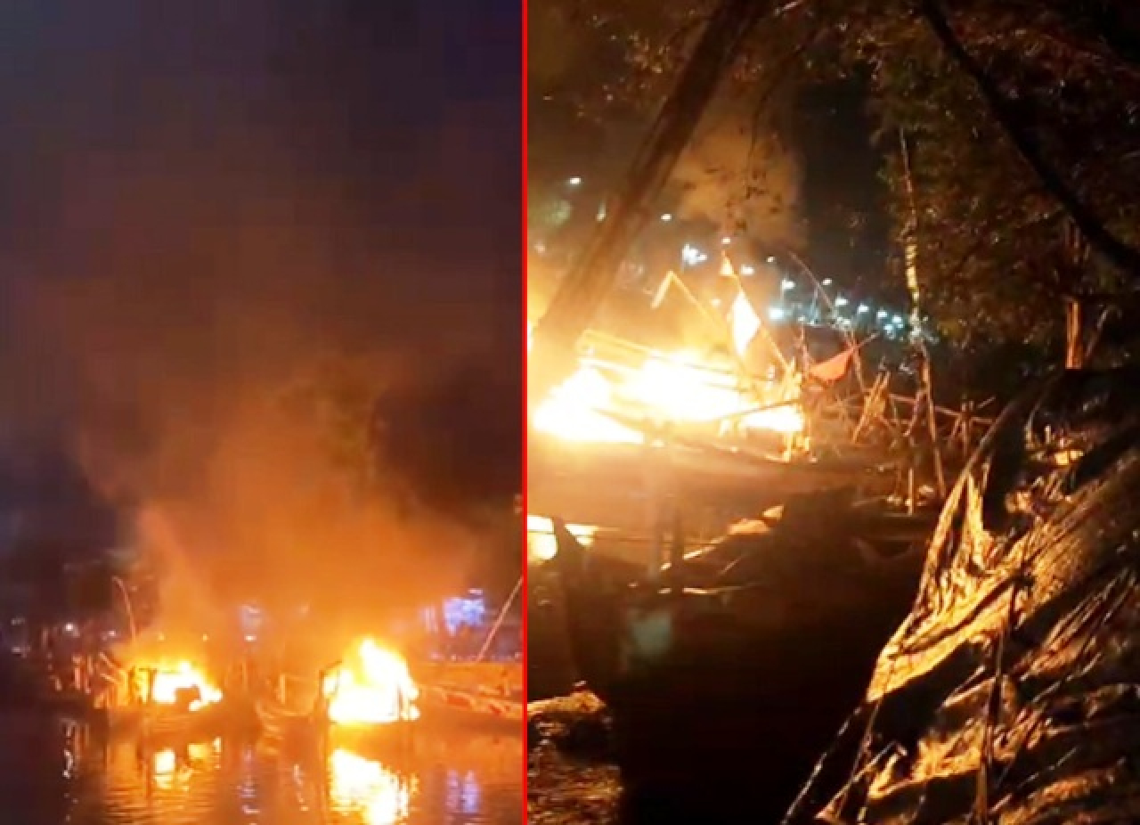 kapal nelayan dibakar massa.