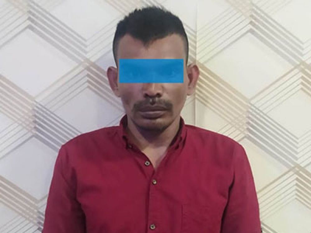 Hamdani, polisi gadungan ditahan di Polres Aceh Timur.