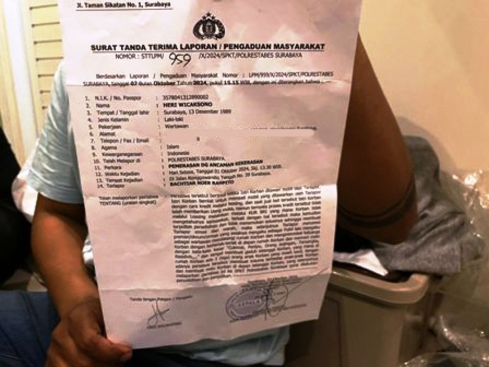 Bukti pengaduan Heri Boncel di Polrestabes Surabaya.